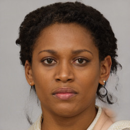 Neutral black young-adult female with short  brown hair and brown eyes