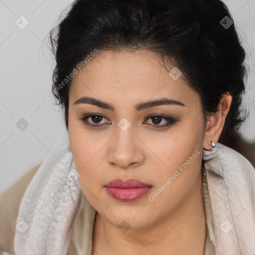 Joyful latino young-adult female with long  brown hair and brown eyes