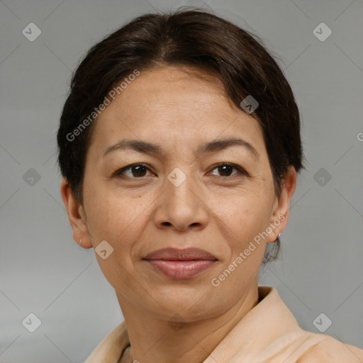 Joyful white adult female with short  brown hair and brown eyes