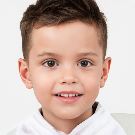 Joyful white child male with short  brown hair and brown eyes