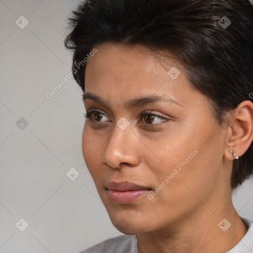 Neutral white young-adult female with medium  brown hair and brown eyes