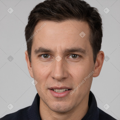 Joyful white adult male with short  brown hair and brown eyes