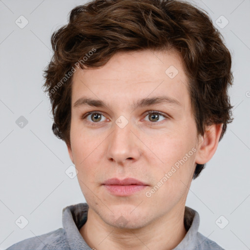 Neutral white young-adult male with short  brown hair and grey eyes