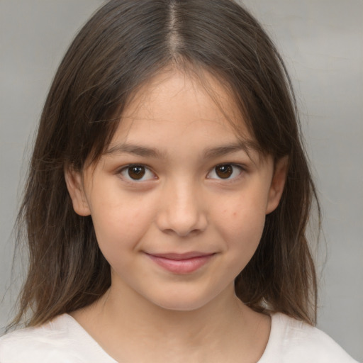 Joyful white child female with medium  brown hair and brown eyes