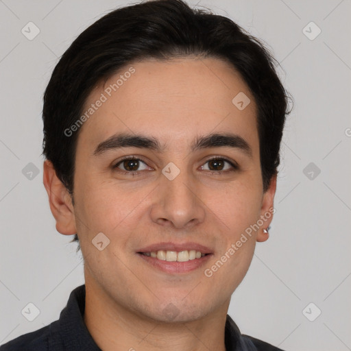 Joyful white young-adult male with short  black hair and brown eyes