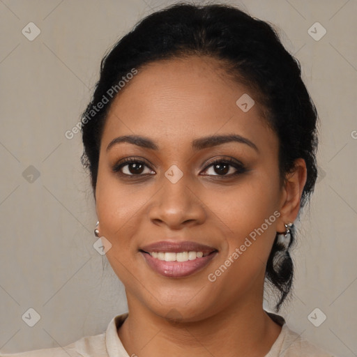 Joyful latino young-adult female with medium  brown hair and brown eyes