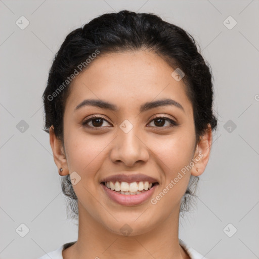 Joyful latino young-adult female with short  brown hair and brown eyes