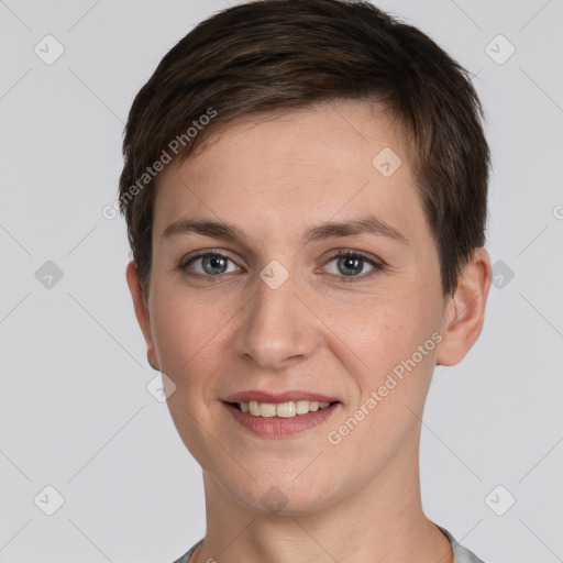 Joyful white young-adult female with short  brown hair and brown eyes