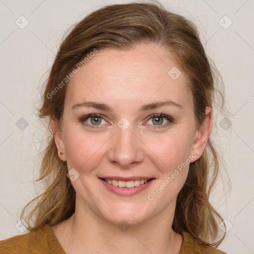 Joyful white young-adult female with medium  brown hair and blue eyes