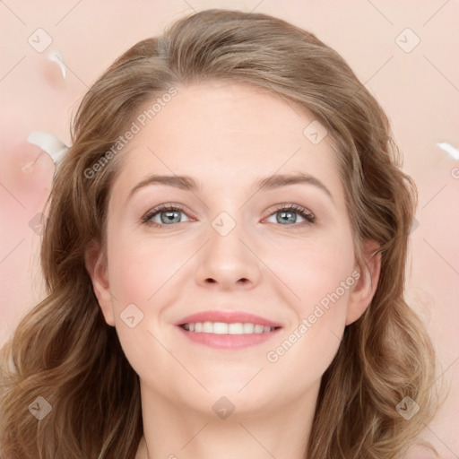 Joyful white young-adult female with long  brown hair and blue eyes