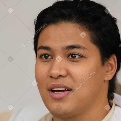 Joyful latino young-adult female with short  brown hair and brown eyes