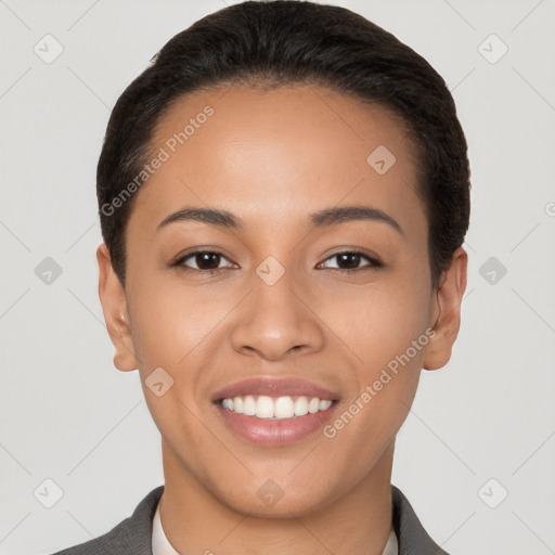 Joyful latino young-adult female with short  brown hair and brown eyes