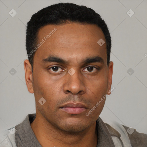 Neutral latino young-adult male with short  black hair and brown eyes