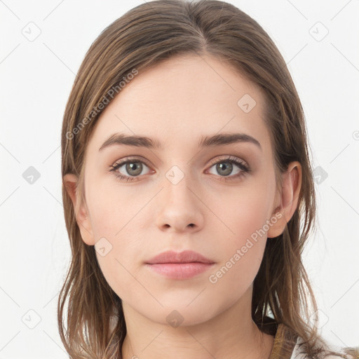 Neutral white young-adult female with long  brown hair and brown eyes