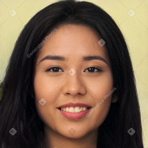 Joyful latino young-adult female with long  black hair and brown eyes