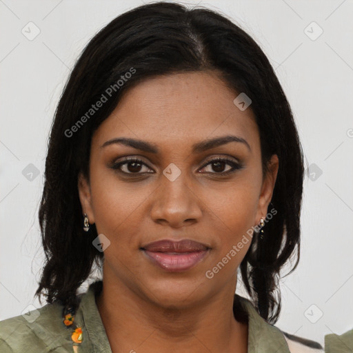 Joyful black young-adult female with medium  brown hair and brown eyes