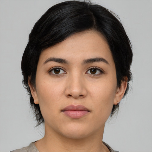 Neutral white young-adult female with medium  black hair and brown eyes