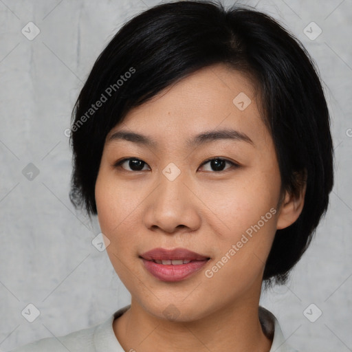 Joyful asian young-adult female with medium  black hair and brown eyes