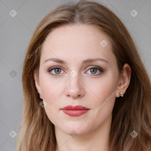 Joyful white young-adult female with long  brown hair and blue eyes