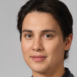 Joyful white young-adult male with medium  brown hair and brown eyes