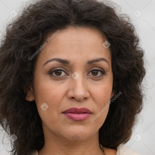 Joyful white adult female with long  brown hair and brown eyes