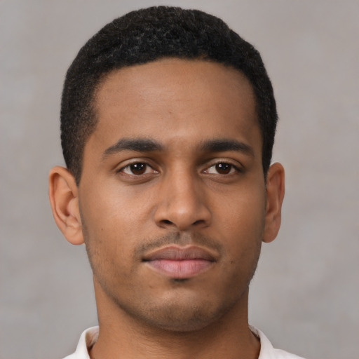 Neutral latino young-adult male with short  brown hair and brown eyes