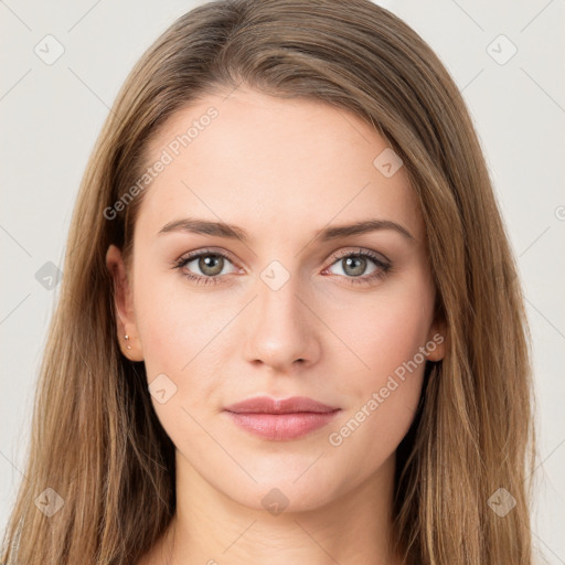 Neutral white young-adult female with long  brown hair and green eyes