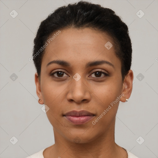 Joyful latino young-adult female with short  black hair and brown eyes