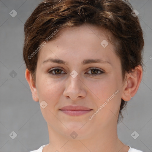 Joyful white young-adult female with short  brown hair and brown eyes