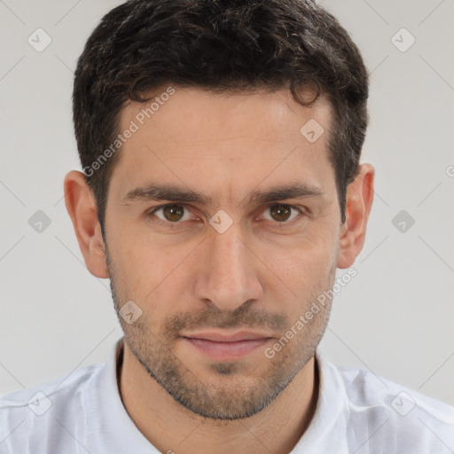 Joyful white young-adult male with short  brown hair and brown eyes