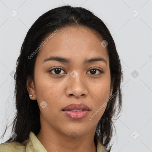 Joyful latino young-adult female with medium  brown hair and brown eyes