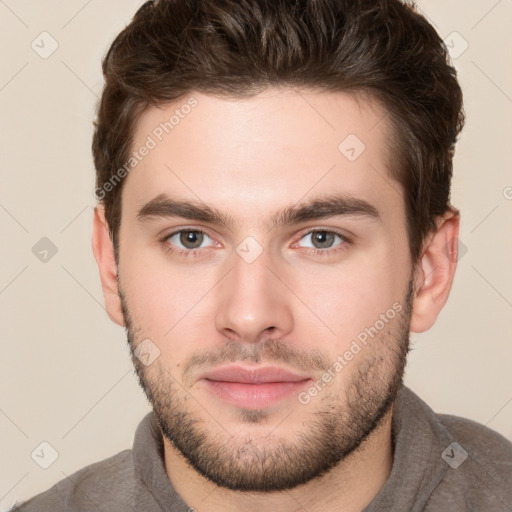 Neutral white young-adult male with short  brown hair and brown eyes