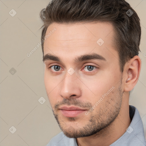 Neutral white young-adult male with short  brown hair and brown eyes