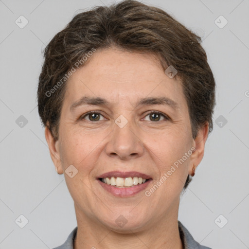 Joyful white adult female with short  brown hair and brown eyes