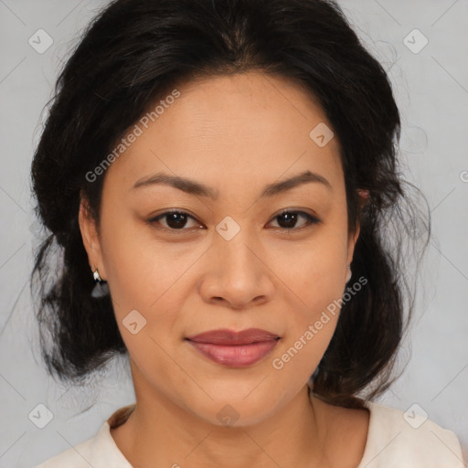 Joyful asian adult female with medium  brown hair and brown eyes