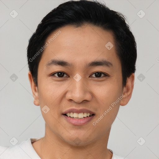 Joyful latino young-adult male with short  brown hair and brown eyes