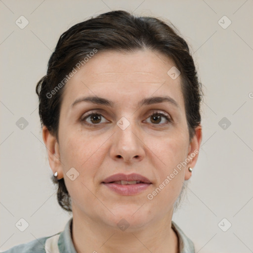 Joyful white adult female with short  brown hair and brown eyes