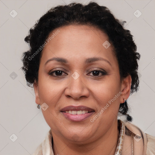 Joyful latino adult female with short  brown hair and brown eyes