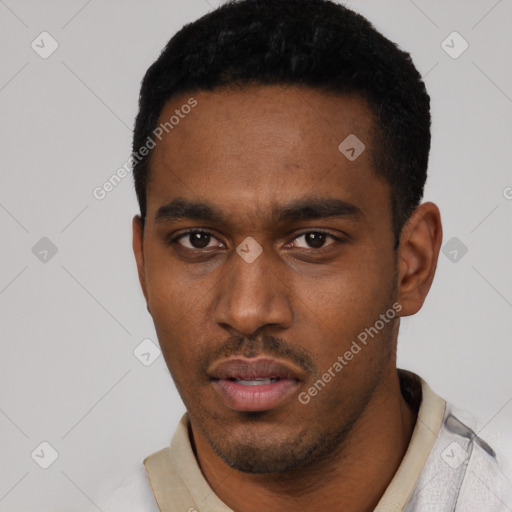 Neutral latino young-adult male with short  black hair and brown eyes