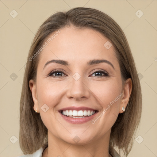 Joyful white young-adult female with medium  brown hair and grey eyes