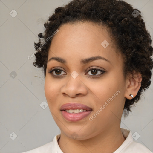 Joyful black young-adult female with medium  brown hair and brown eyes