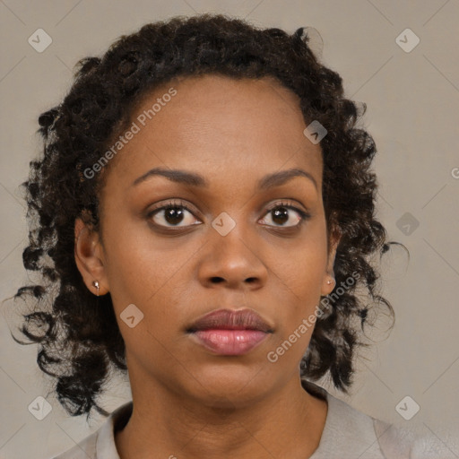 Neutral black young-adult female with medium  brown hair and brown eyes