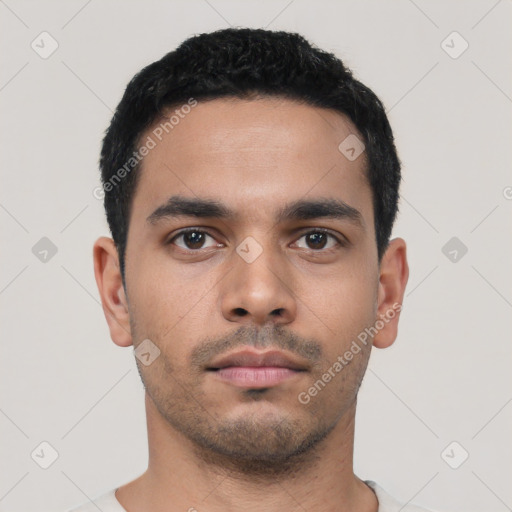 Neutral latino young-adult male with short  black hair and brown eyes