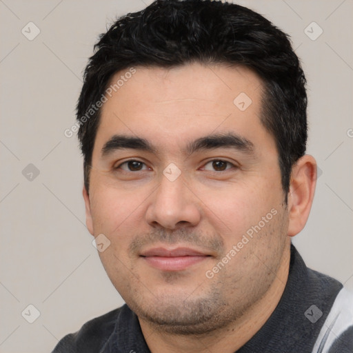 Joyful white young-adult male with short  black hair and brown eyes