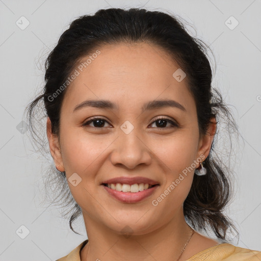 Joyful latino young-adult female with medium  brown hair and brown eyes