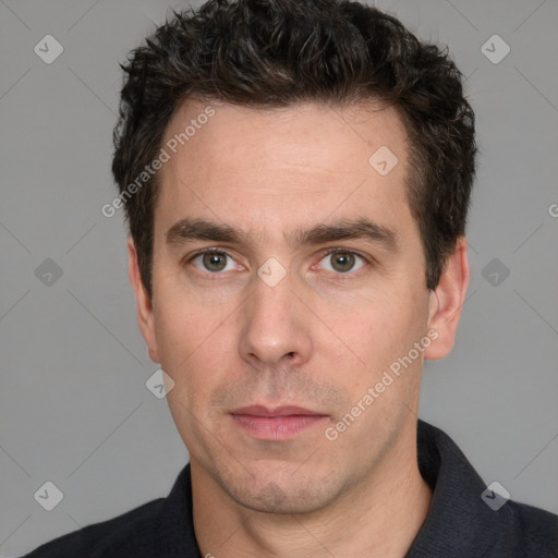 Neutral white adult male with short  brown hair and brown eyes