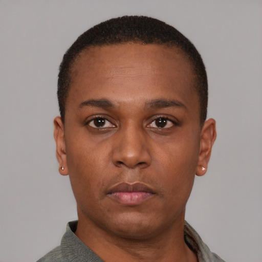 Neutral latino young-adult male with short  brown hair and brown eyes