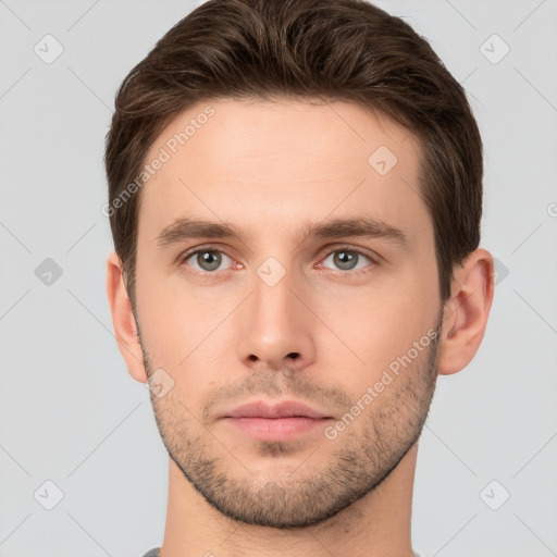 Neutral white young-adult male with short  brown hair and brown eyes