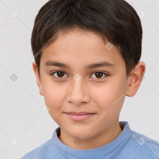 Joyful white child male with short  brown hair and brown eyes