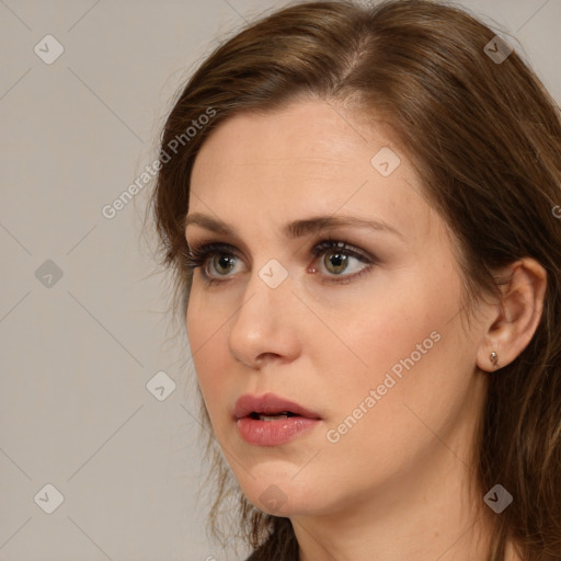 Neutral white young-adult female with medium  brown hair and brown eyes